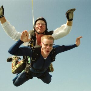 Exhilarating tandem skydiving experience in Baldwin, Wisconsin, captured in mid-air.